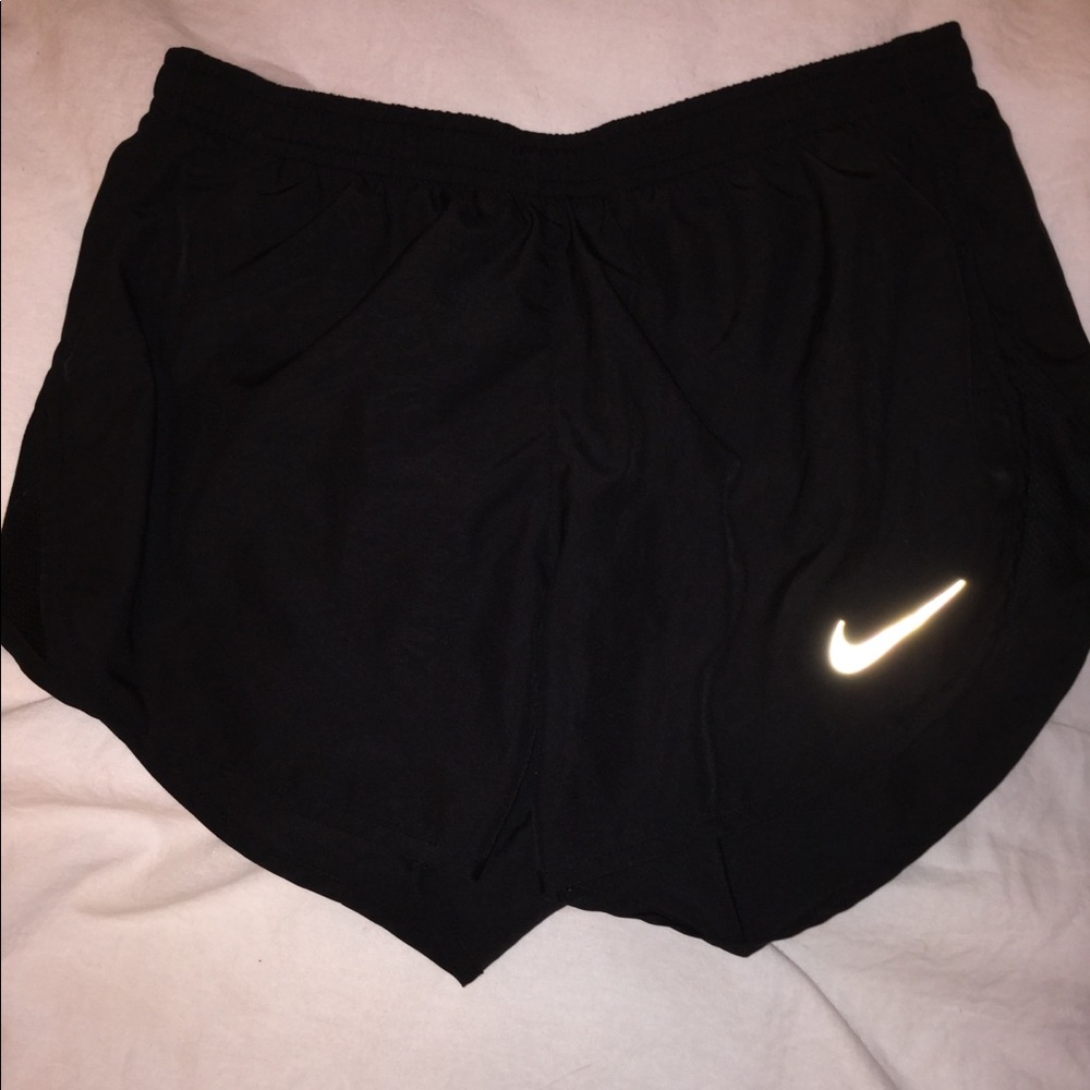 Black Nike running shorts